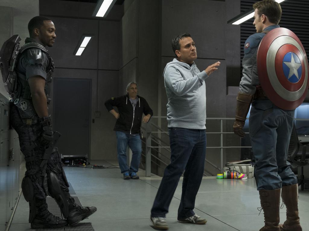 Anthony Mackie, director Joe Russo and Chris Evans making Captain America: The Winter Soldier in 2014 Picture: Supplied