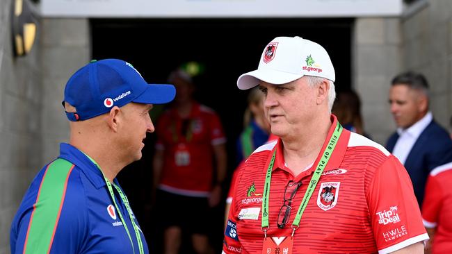 Nathan Brow (L in 2022 when coach of the Warriors) chats with Dragons coach Anthony Griffin. Picture: Getty Images