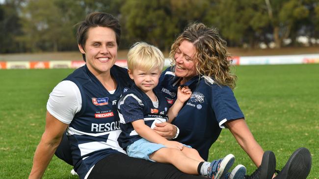 Lisa Whiteley joins former teammate Courtney Gum (pictured left) and ex-Panthers senior coach Krissie Steen (pictured right with their son Buz) at GWS next year. Gum plays for the Giants and Steen is an assistant at the AFLW club. Picture: AAP/Keryn Stevens