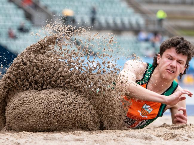 26th September 2022. News Local. Sport.Sydney Olympic Park, Sydney, NSW, Australia.NSW All Schools Athletics. Pics by Julian Andrews.Action pics from NSW All Schools Athletics.Pic Shows action from the boys long jump 16 years final.Competition winner Tristan Tubbs 16  from Carringbah High.