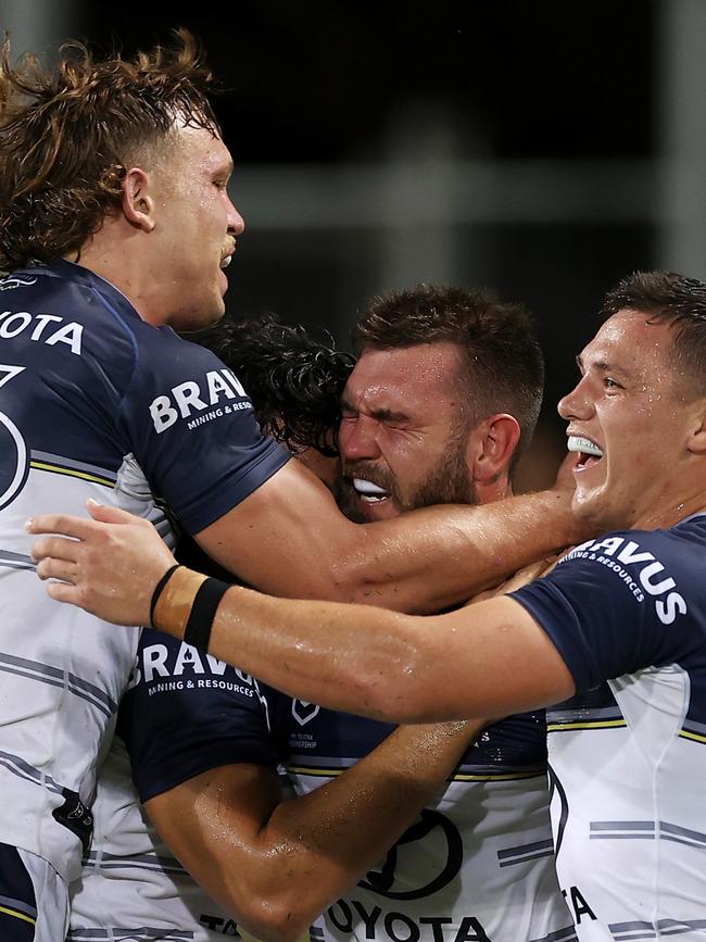 Cowboys players celebrate a try this year.