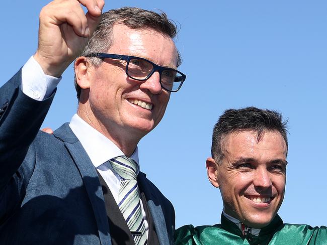 MELBOURNE, AUSTRALIA - FEBRUARY 29: Trainer of Alligator Blood, David Vandyke (L) and Jockey Ryan Maloney celebrate after winning Race 7 the Kennedy Australian Guineas during Melbourne Racing at Flemington Racecourse on February 29, 2020 in Melbourne, Australia. (Photo by Jack Thomas/Getty Images)