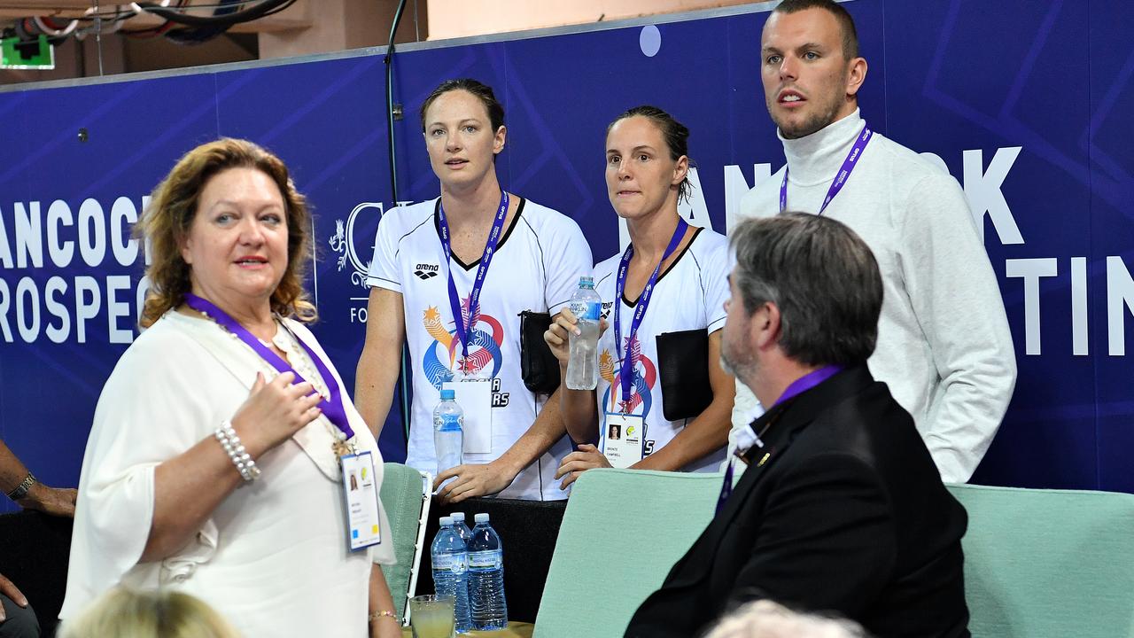 Gina Rinehart talking to swimmers Cate Campbell, Bronte Campbell and Kyle Chalmers at the 2018 Australian Swimming Trials. AAP Image/Darren England.