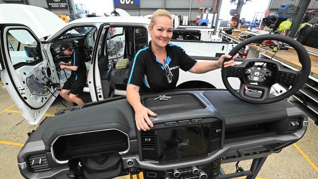 Melissa Tam with a soon-to-be-modified left to right-hand drive dash for a Ford Lightning F-150 EV ute. Picture: Lyndon Mechielsen