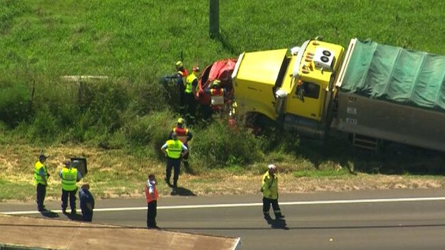 A person has died after a horrific crash between a car and a truck on Mamre Rd, Kemps Creek. Picture: 7 News