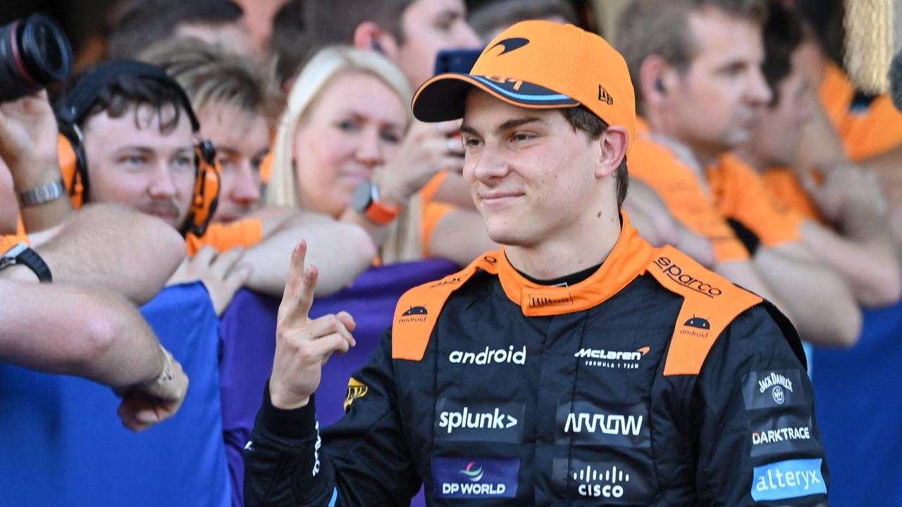 McLaren's Australian driver Oscar Piastri celebrates finishing in second in the qualifying session for the Formula One Japanese Grand Prix at the Suzuka circuit, Mie prefecture on September 23, 2023. (Photo by Kazuhiro NOGI / AFP)