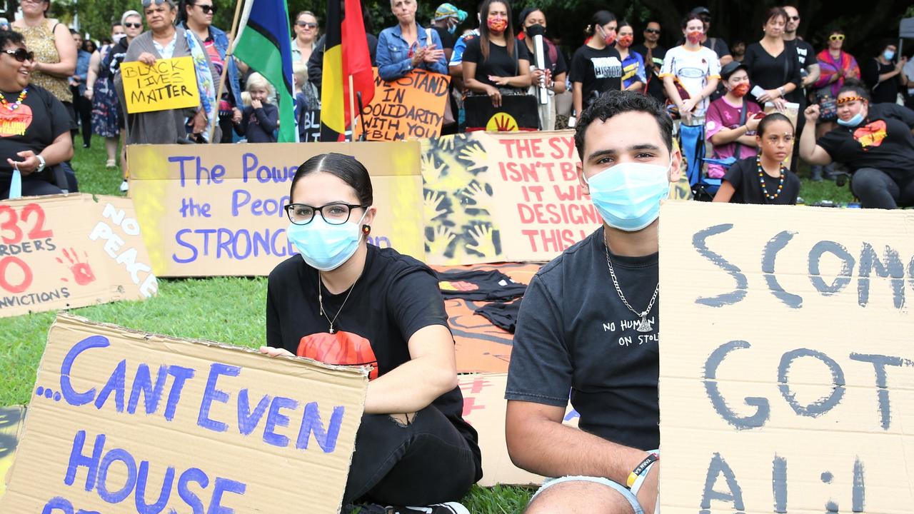 Stephina Tranby and Daniel Rosendale stand up the the Black Lives Matter movement in Cairns on Sunday. Picture: PETER CARRUTHERS