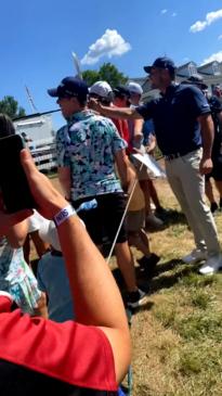 Pro golfer Bryson DeChambeau screams at fan to give ball back to kid