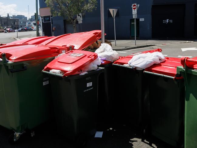 SURRY HILLS, SYDNEY, AUSTRALIA - NewsWire Photos FEBRUARY 15th, 2023: Over flowing rubbish spills out of residents bins due to the rubbish collection strike in Surry Hills.Picture: NCA NewsWire / Tim Pascoe