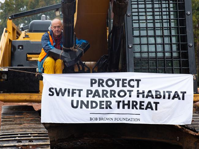 A Bob Brown Foundation protester locked onto forestry machinery in the Eastern Tiers last December. Picture: BOB BROWN FOUNDATION