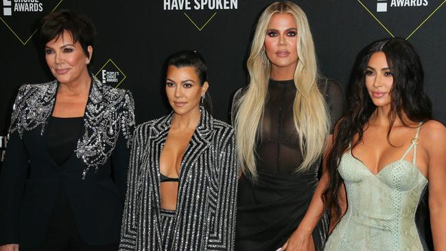 (FILES) In this file photo taken on November 10, 2019 (L-R) business women/media personalities Kris Jenner, Kourtney Kardashian, Khloe Kardashian and Kim Kardashian arrive for the 45th annual E! People's Choice Awards at Barker Hangar in Santa Monica, California. - Reality television's royal family, the Kardashians, have inked a deal with Disney and will launch new content in 2021 on the entertainment giant's Hulu and Star streaming subsidiaries, the platforms said on December 10, 2020. (Photo by Jean-Baptiste Lacroix / AFP)