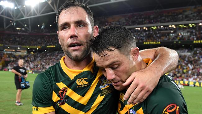 Cameron Smith of Australia (left) and teammate Cooper Cronk.