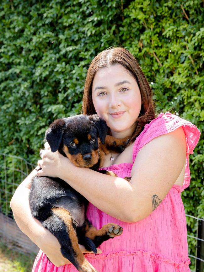 Maliah Pini with her rottweiler puppy Nera. Picture: Richard Walker