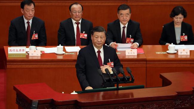 Chinese President Xi Jinping, centre, in the Great Hall of the People in Beijing on Monday. Picture: Getty Images