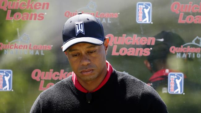 Tiger Woods failed to impress when playing some ceremonial shots at to launch the Quicken Loans National golf tournament.
