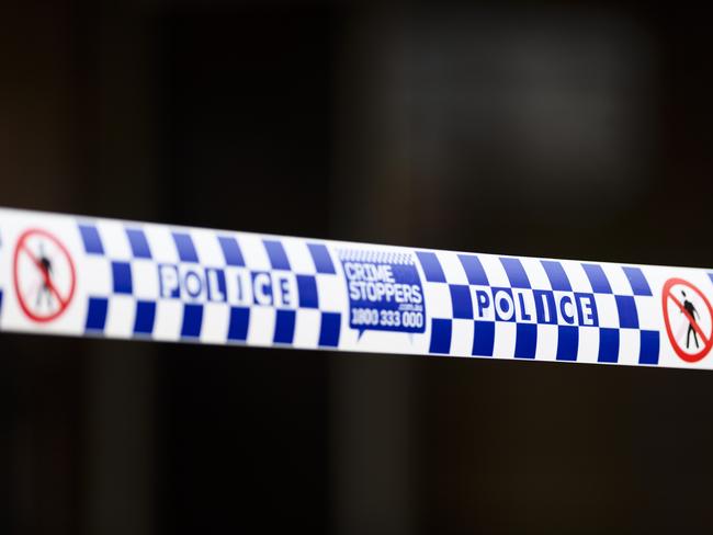 Generic police tape at a crime scene with Crime Stoppers number, qps, queensland police service, Sunday, March 23, 2025. Picture: Kevin Farmer