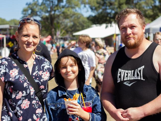 Nikkita and Xavier Rowlands with Daniel Justice at the Moore Park Beach Arts Festival.