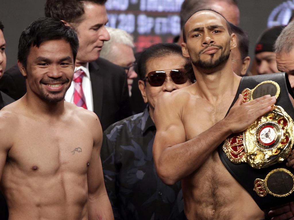 Thurman (right) is a boxing legend who has lost just once to Manny Pacquiao (left).