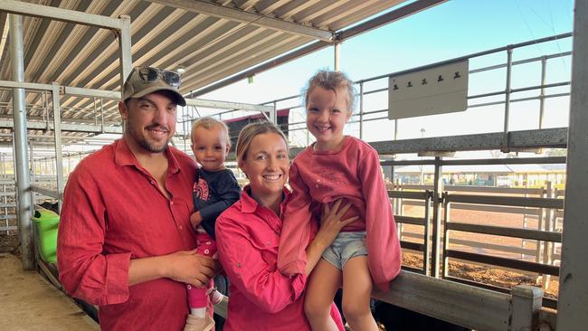 Sam and Kelly Livinstone, Rutherglen and their children Addi, 1, and Macey, 5, bought Angus cows and calves at Wodonga.