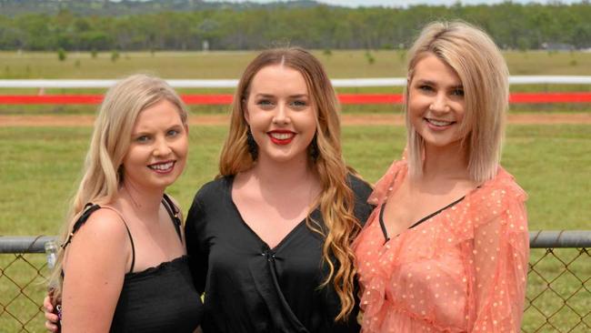 STYLE TAKES THE WIN: Monique Hill, Riley Campbell and Chelsea Steinhardt at the Nanango Races. Picture: Claudia Williams