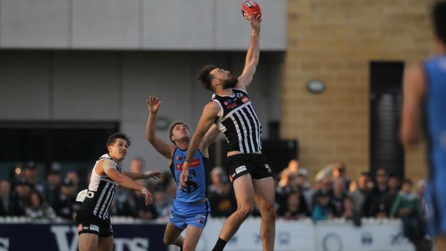 Port's Charlie Dixon attempts to mark late in the last quarter in the clash against Sturt. Picture: AAP/Dean Martin