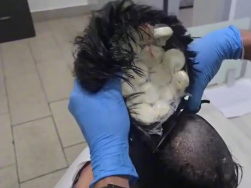 More than ‘400 doses’ of cocaine were found concealed in the hairpiece.