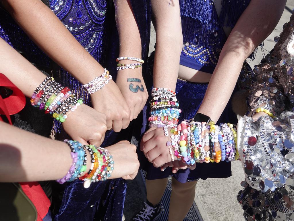 Friendship bracelets on fans at her concert in Melbourne. Picture: NCA NewsWire / Valeriu Campan.
