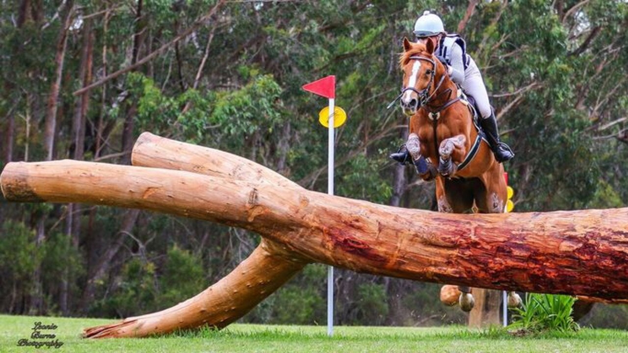 Eskimo Joe and Georgia Barnett navigate the cross country course together.