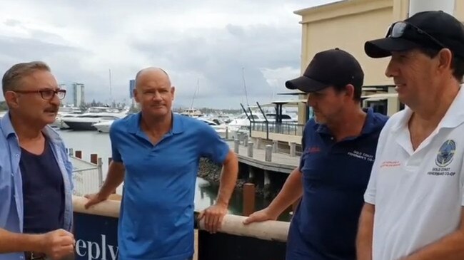 Gold Coast City Council candidate Eddy Sarroff and members of the Gold Coast Fisherman's Co-operative which is at risk with its lease expiring.