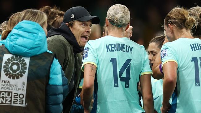 Matildas Tony Gustafson talks to his troops Photo by Michael Klein.