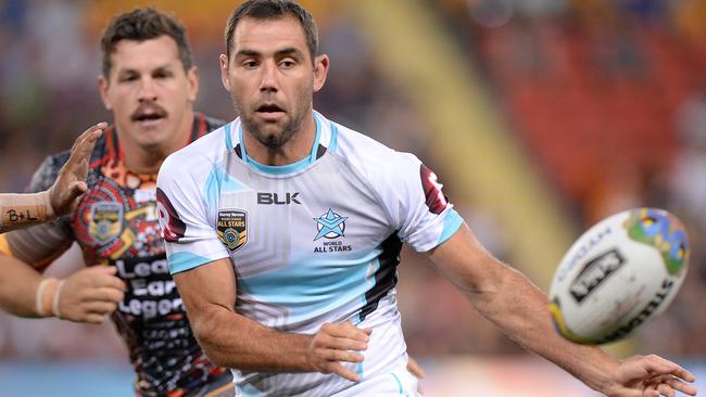 BRISBANE, AUSTRALIA - FEBRUARY 13: Cameron Smith of the World All Stars passes the ball during the NRL match between the Indigenous All-Stars and the World All-Stars at Suncorp Stadium on February 13, 2016 in Brisbane, Australia. (Photo by Bradley Kanaris/Getty Images)