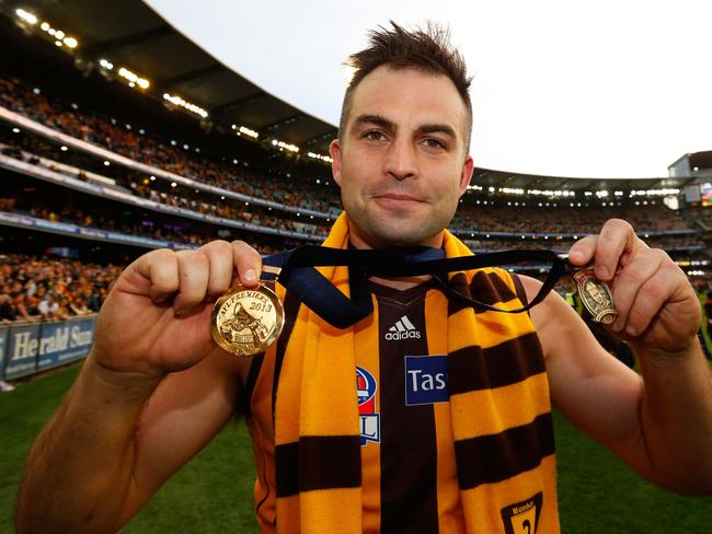 Brian Lake’s 2013 flag and Norm Smith Medal while at the Hawks seemed like a world away a year earlier. Picture: Michael Willson/AFL Media