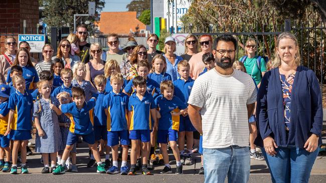 MELBOURNE, MARCH 18, 2025: *NOTE PHOTOGRAPHER NOT ALLOWED ON SCHOOL PROPERTY AND NO AREAS THEY WANT SHADED ARE VISIBLE FROM STREET* Students and parents at Edithvale Primary School are upset it is devoid of any shade or protection from rain. The school council has been pushing for a $270,000 shade cloth but it has been denied. Pictured are school council president Andrew Murray and vice president Katie Tobin. Picture: Mark Stewart