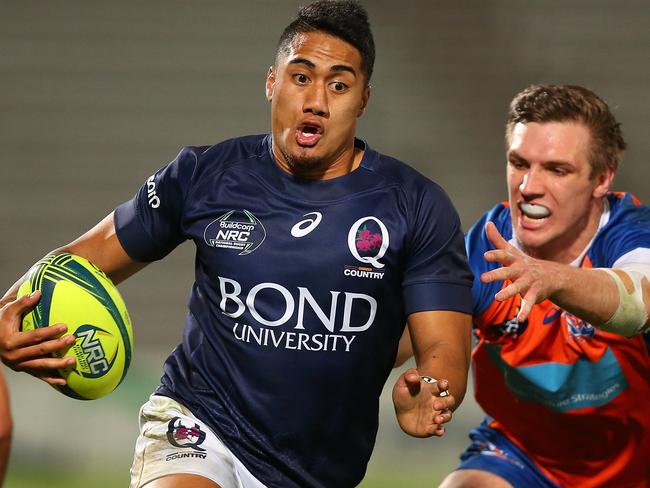 JJ Taulagi of Queensland Country makes a break against the Greater Sydney Rams.