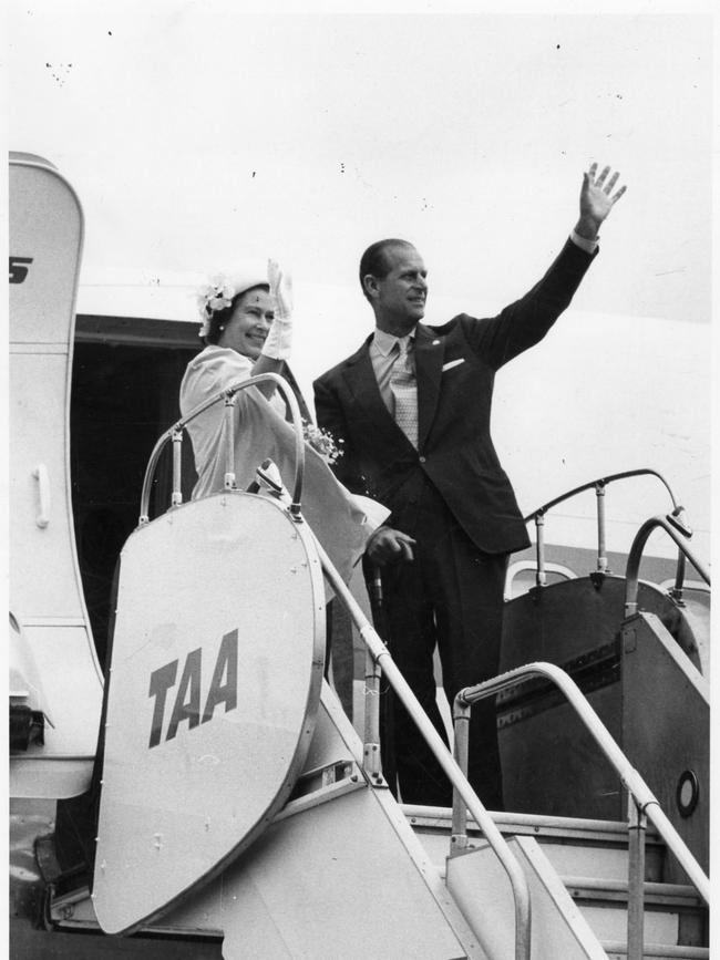The Queen and Prince Philip wave to the crowd at Adelaide Airport before departing.