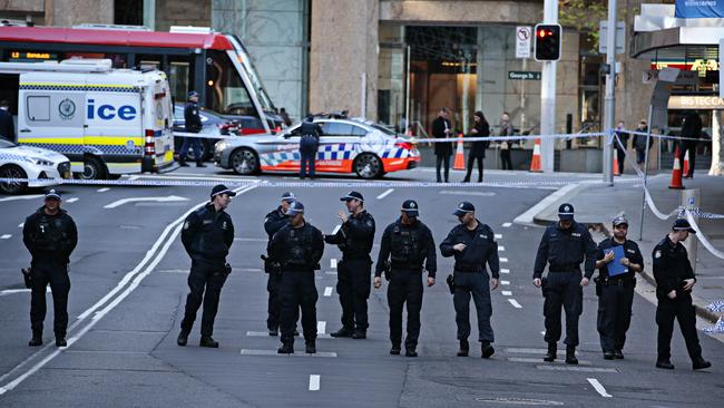 Police at the crime scene where gangster Bilal Hamze was executed by a gunman on Bridge st in the city on the 18 June. Picture: Adam Yip