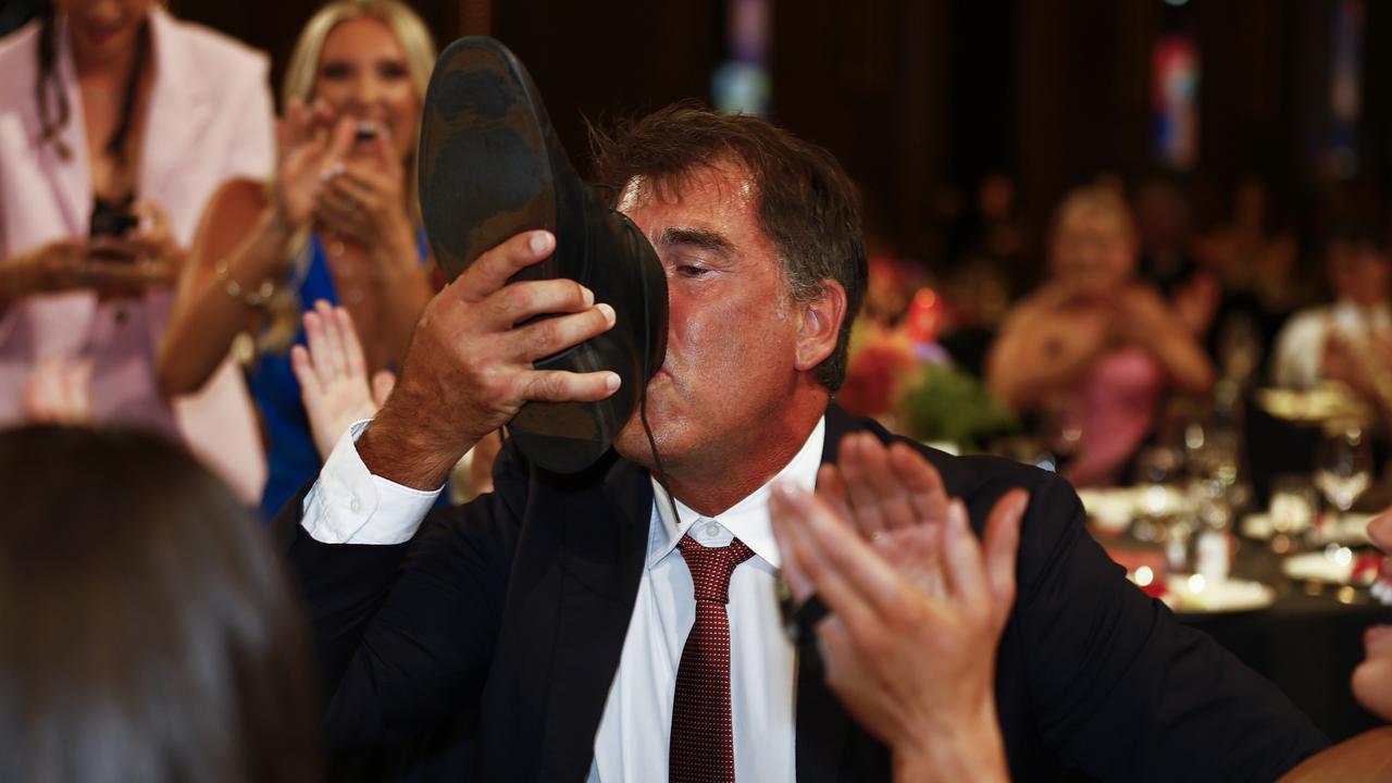 AFLW Lions head coach Craig Starcevich delivers on his promise to “pull a shoey” at the request of Emily Bates after she won the 2022 AFLW Best and Fairest Award at the 2022 AFLW W Awards at Crown Palladium on April 05, 2022 in Melbourne, Australia. Picture: Daniel Pockett/AFL Photos/Getty Images