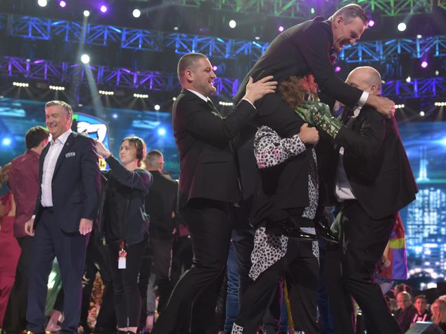 Sam Newman gets chaired by the Footy Show cast after the 2018 Grand Final Footy Show. Picture: Channel 9