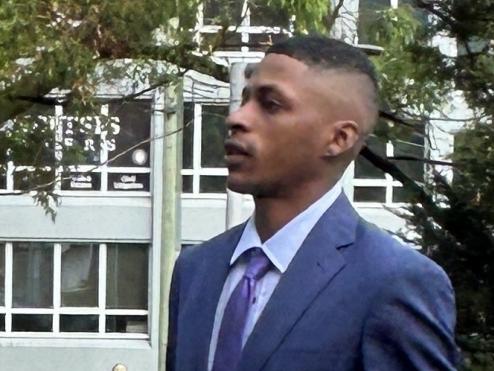 Angel Torres (blue suit), 24, arriving at Gosford District Court after pleading not guilty to raping a woman at Terrigal in March 2024. Picture: NewsLocal