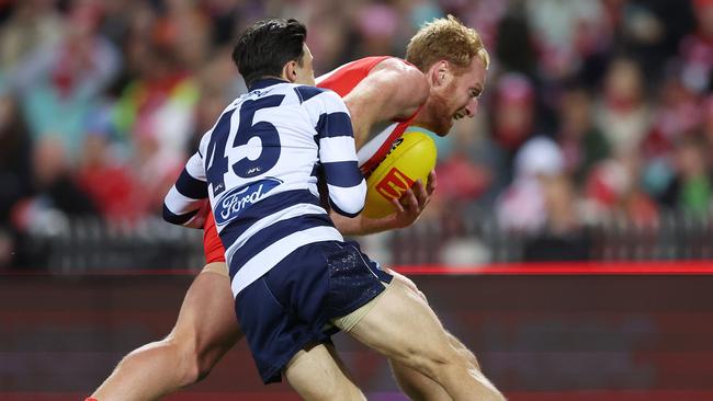 SYDNEY, AUSTRALIA – JUNE 30: Aaron Francis of the Swans is tackled by Brad Close of the Cats during the round 16 AFL match between Sydney Swans and Geelong Cats at Sydney Cricket Ground, on June 30, 2023, in Sydney, Australia. (Photo by Mark Metcalfe/AFL Photos/via Getty Images)