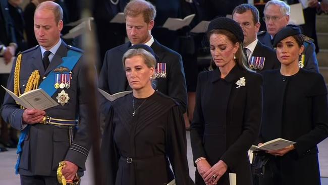 Prince William, Prince Harry, Kate Middleton and Meghan Markle stood together at the service for her Majesty at Westminster Hall. Picture: BBC