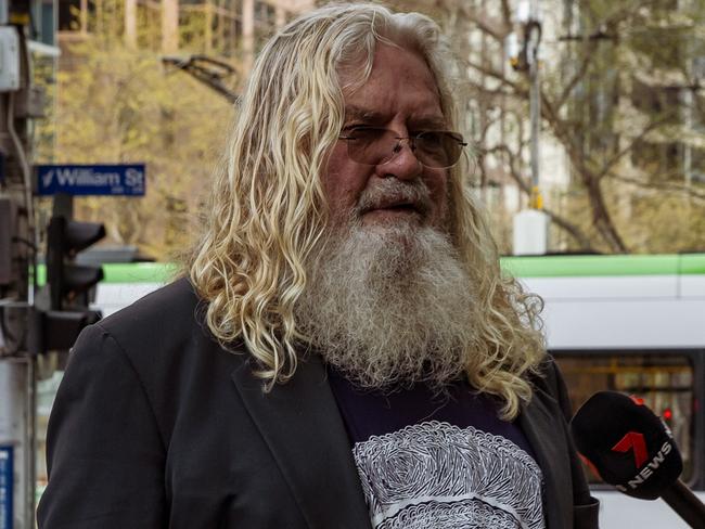 MELBOURNE, AUSTRALIA. NewsWire Photos. SEPTEMBER 11, 2024. Geoffrey Clark speaks with reporters as he arrives at the County Court of Victoria for his sentencing hearing, while his legal representatives remain by his side. Picture: NewsWire/Tamati Smith.