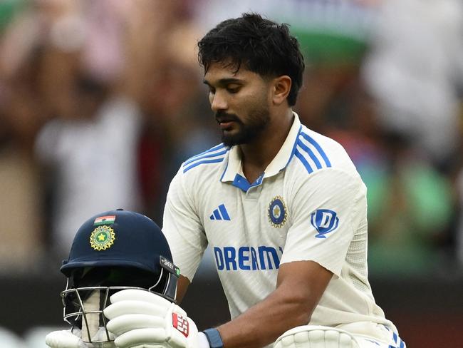 MELBOURNE, AUSTRALIA - DECEMBER 28: Nitish Kumar Reddy of India celebrates his century during day three of the Men's Fourth Test Match in the series between Australia and India at Melbourne Cricket Ground on December 28, 2024 in Melbourne, Australia. (Photo by Quinn Rooney/Getty Images)