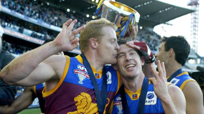 Brisbane 2003 premiership teammates Michael Voss (left) and Craig McRae are now coaching against the Lions in this year’s finals series. Picture: Kelly Barnes