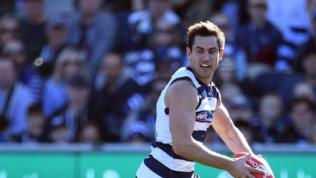 Daniel Menzel in action for the Cats Picture: Julian Smith