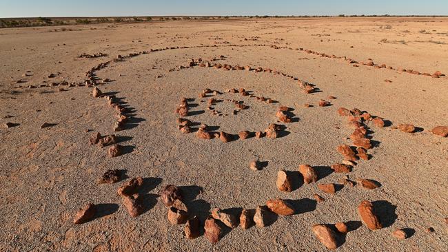 The research team are completing a geophysical survey of site in an attempt to help understand the purpose of the secret stone structures on Mithika lands north of Birdsville. Picture: Lyndon Mechielsen/The Australian