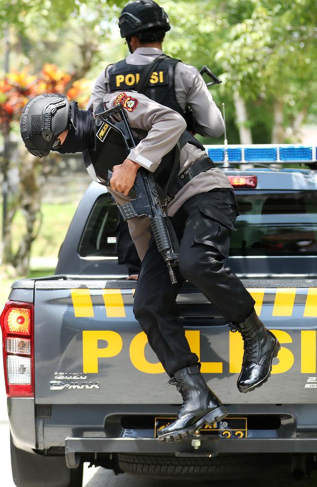 Armed police arrive at Bangli jail. Picture: Liam Kidston