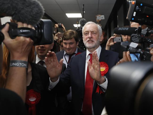 Cameras flock around Labour leader Jeremy Corbyn as he arrives for the declaration at his London constituency. Picture: Frank Augstein/AP