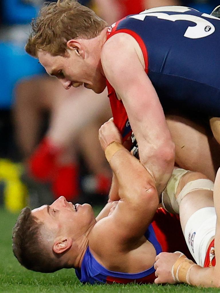 Zorko and Petty wrestle on the ground. Picture: Michael Willson/AFL Photos via Getty Images