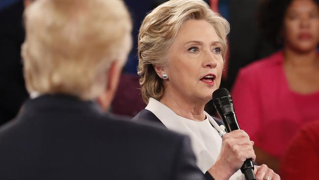 Clinton and Trump. AFP PHOTO / POOL / RICK WILKING